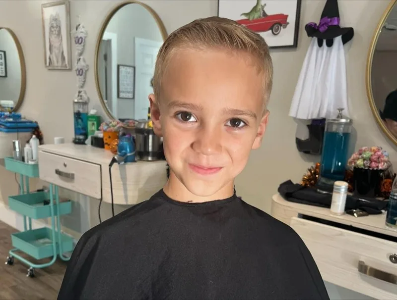 Smiling boy after his haircut at Max & Mia Children's Salon